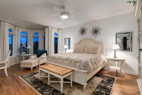 100-274256 272 Street West, Rural Foothills County, AB - Indoor Photo Showing Bedroom