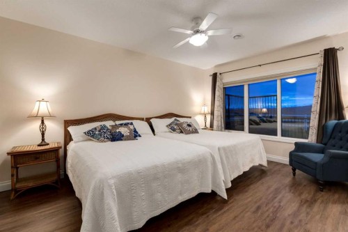 100-274256 272 Street West, Rural Foothills County, AB - Indoor Photo Showing Bedroom