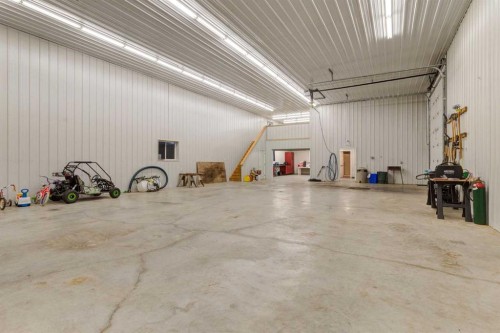 100-274256 272 Street West, Rural Foothills County, AB - Indoor Photo Showing Garage