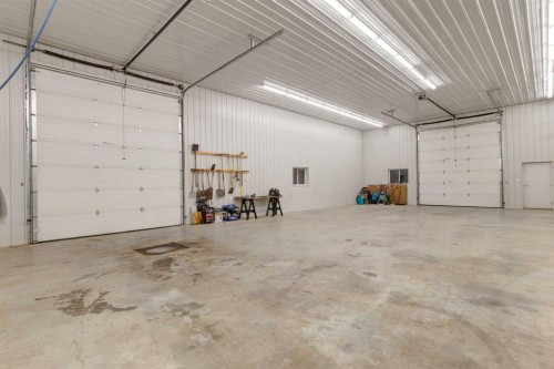 100-274256 272 Street West, Rural Foothills County, AB - Indoor Photo Showing Garage