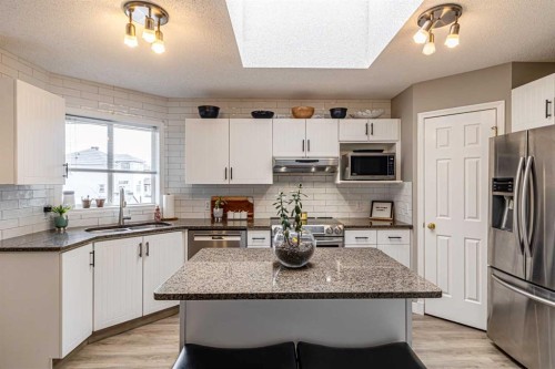 79 West Lakeview Passage, Chestermere, AB - Indoor Photo Showing Kitchen With Stainless Steel Kitchen With Upgraded Kitchen