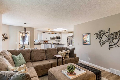 79 West Lakeview Passage, Chestermere, AB - Indoor Photo Showing Living Room