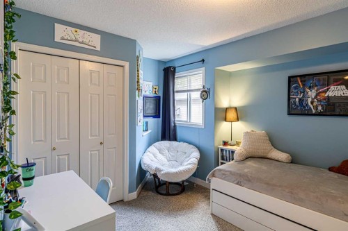 79 West Lakeview Passage, Chestermere, AB - Indoor Photo Showing Bedroom