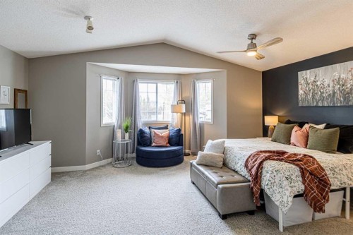 79 West Lakeview Passage, Chestermere, AB - Indoor Photo Showing Bedroom