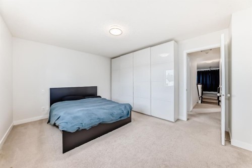 799 Tuscany Drive Nw, Calgary, AB - Indoor Photo Showing Bedroom