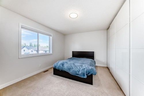 799 Tuscany Drive Nw, Calgary, AB - Indoor Photo Showing Bedroom