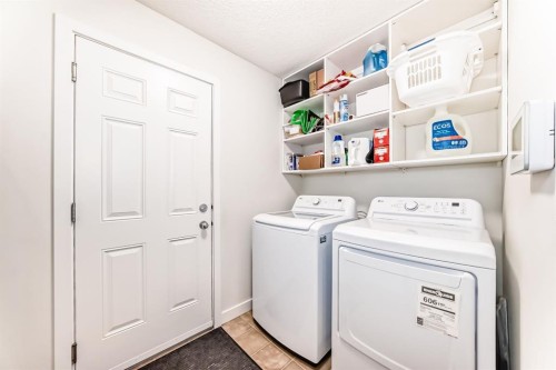 799 Tuscany Drive Nw, Calgary, AB - Indoor Photo Showing Laundry Room