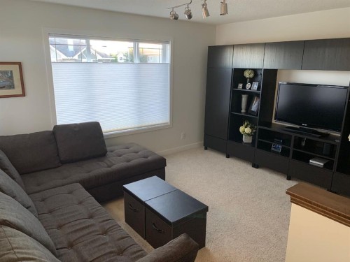 799 Tuscany Drive Nw, Calgary, AB - Indoor Photo Showing Living Room