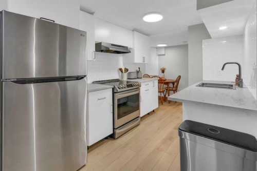 77 Hogarth Crescent Sw, Calgary, AB - Indoor Photo Showing Kitchen With Stainless Steel Kitchen