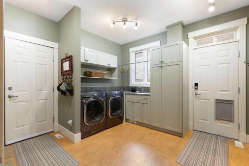7 Discovery Ridge Cove Sw, Calgary, AB - Indoor Photo Showing Laundry Room