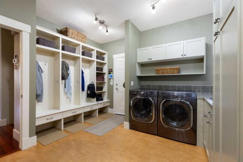 7 Discovery Ridge Cove Sw, Calgary, AB - Indoor Photo Showing Laundry Room