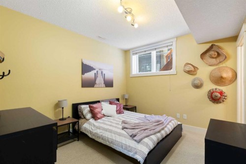 7 Discovery Ridge Cove Sw, Calgary, AB - Indoor Photo Showing Bedroom