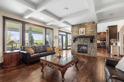 11 Timberline Gate Sw, Calgary, AB - Indoor Photo Showing Living Room With Fireplace