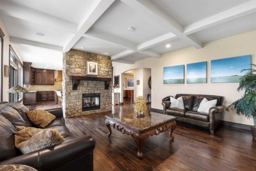 11 Timberline Gate Sw, Calgary, AB - Indoor Photo Showing Living Room With Fireplace