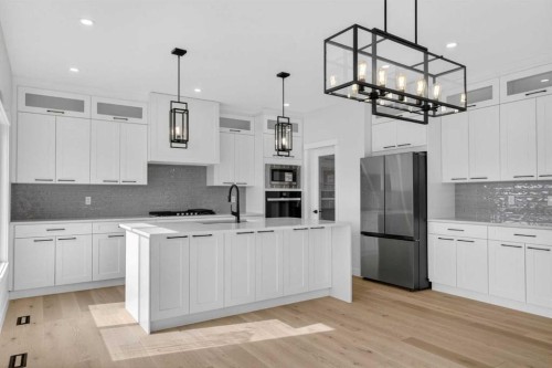 14 Ranchers Meadows, Okotoks, AB - Indoor Photo Showing Kitchen With Upgraded Kitchen