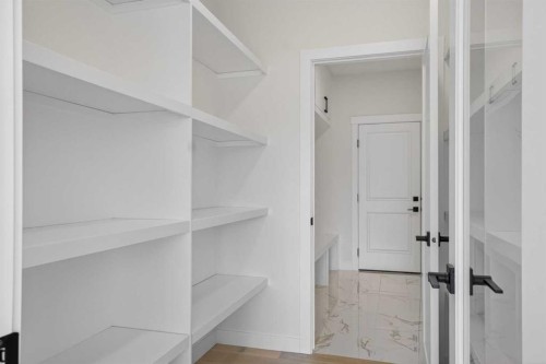 14 Ranchers Meadows, Okotoks, AB - Indoor With Storage
