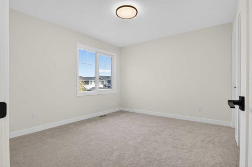 14 Ranchers Meadows, Okotoks, AB - Indoor Photo Showing Other Room