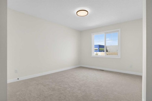 14 Ranchers Meadows, Okotoks, AB - Indoor Photo Showing Other Room