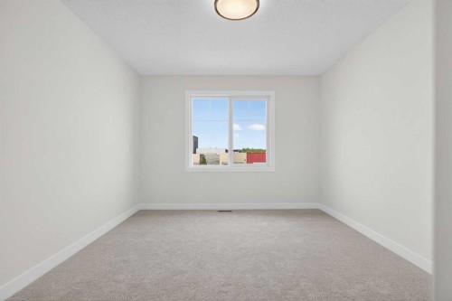 14 Ranchers Meadows, Okotoks, AB - Indoor Photo Showing Other Room