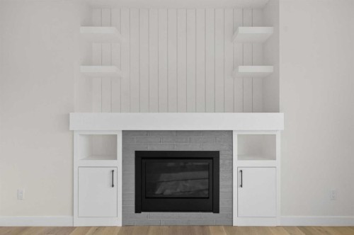 14 Ranchers Meadows, Okotoks, AB - Indoor Photo Showing Living Room With Fireplace