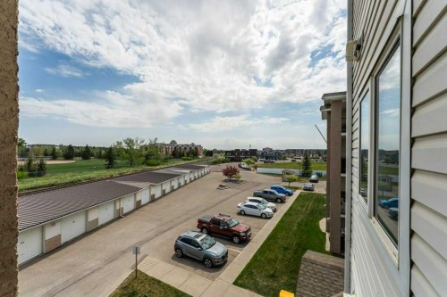 303-300 Edwards Way Nw, Airdrie, AB - Indoor Photo Showing Laundry Room