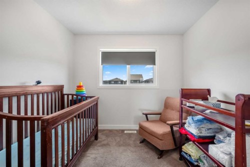 149 Belmont Boulevard Sw, Calgary, AB - Indoor Photo Showing Bedroom