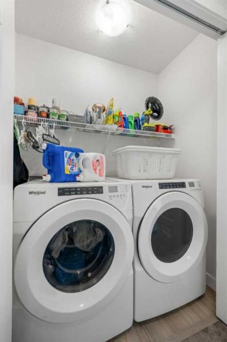 149 Belmont Boulevard Sw, Calgary, AB - Indoor Photo Showing Laundry Room