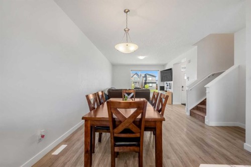 149 Belmont Boulevard Sw, Calgary, AB - Indoor Photo Showing Dining Room