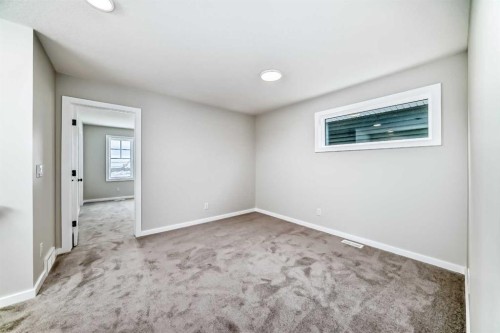 36 Savanna Place Ne, Calgary, AB - Indoor Photo Showing Other Room