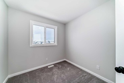36 Savanna Place Ne, Calgary, AB - Indoor Photo Showing Other Room
