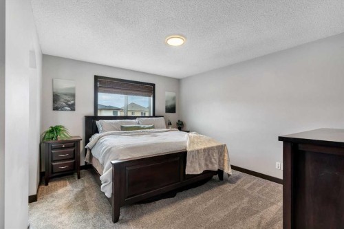 91 Panora Square Nw, Calgary, AB - Indoor Photo Showing Bedroom