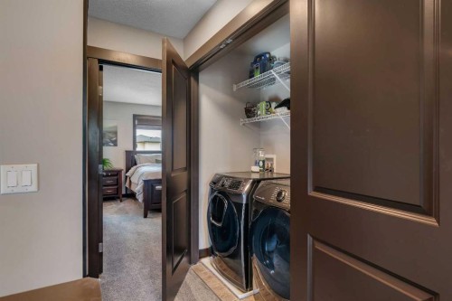 91 Panora Square Nw, Calgary, AB - Indoor Photo Showing Laundry Room