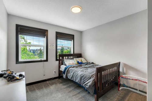 91 Panora Square Nw, Calgary, AB - Indoor Photo Showing Bedroom
