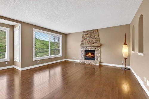 337 Discovery Ridge Boulevard Sw, Calgary, AB - Indoor Photo Showing Living Room With Fireplace