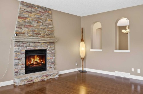 337 Discovery Ridge Boulevard Sw, Calgary, AB - Indoor Photo Showing Living Room With Fireplace