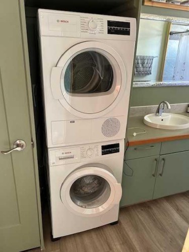 5043-25054 South Pine Lake Road, Rural Red Deer County, AB - Indoor Photo Showing Laundry Room