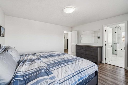 54 Elgin Meadows Green Se, Calgary, AB - Indoor Photo Showing Bedroom