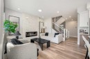 353 Seton Villas Se, Calgary, AB  - Indoor Photo Showing Living Room With Fireplace 