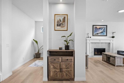 224 Precedence Hill, Cochrane, AB - Indoor With Fireplace