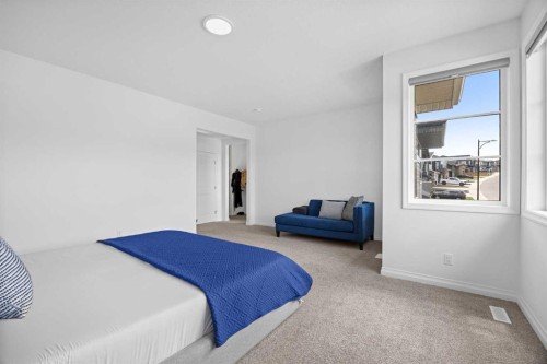 224 Precedence Hill, Cochrane, AB - Indoor Photo Showing Bedroom