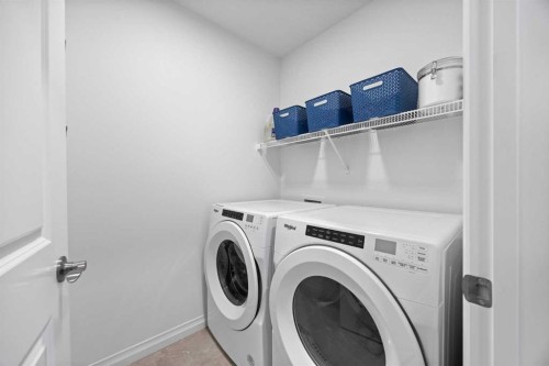 224 Precedence Hill, Cochrane, AB - Indoor Photo Showing Laundry Room
