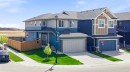 936 Langholm Drive Se, Airdrie, AB  - Outdoor With Facade 