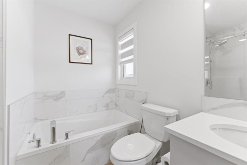 936 Langholm Drive Se, Airdrie, AB - Indoor Photo Showing Bathroom