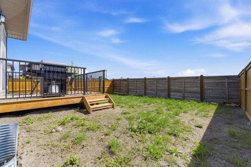 936 Langholm Drive Se, Airdrie, AB - Outdoor With Deck Patio Veranda