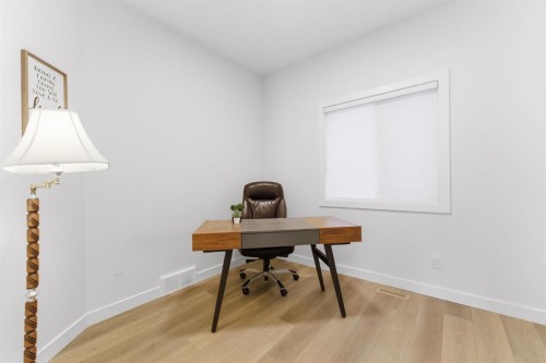 936 Langholm Drive Se, Airdrie, AB - Indoor Photo Showing Office