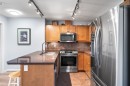 206-30 Cranfield Link Se, Calgary, AB  - Indoor Photo Showing Kitchen With Double Sink 
