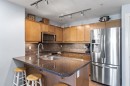 206-30 Cranfield Link Se, Calgary, AB  - Indoor Photo Showing Kitchen With Double Sink 