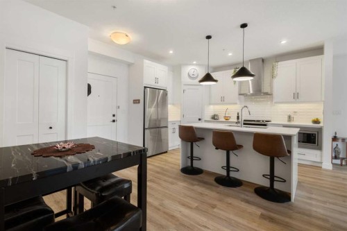 205-10 Sage Hill Walk Nw, Calgary, AB - Indoor Photo Showing Kitchen With Upgraded Kitchen