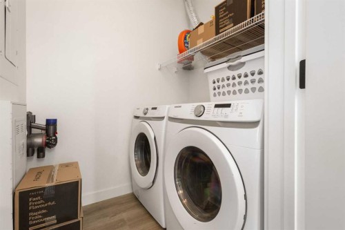 205-10 Sage Hill Walk Nw, Calgary, AB - Indoor Photo Showing Laundry Room