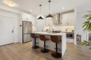 205-10 Sage Hill Walk Nw, Calgary, AB  - Indoor Photo Showing Kitchen With Stainless Steel Kitchen With Upgraded Kitchen 